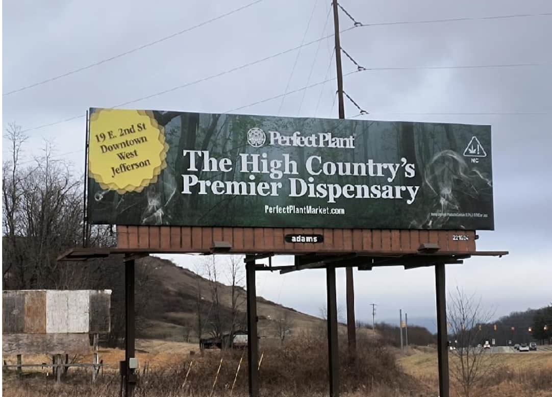 Cannabis dispensary grand opening large billboard in Winston-Salem, North Carolina