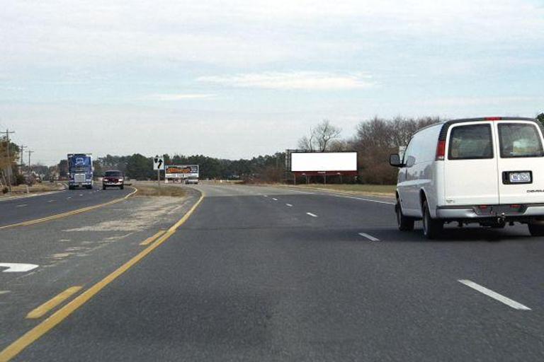 Photo of a billboard in Modest Town