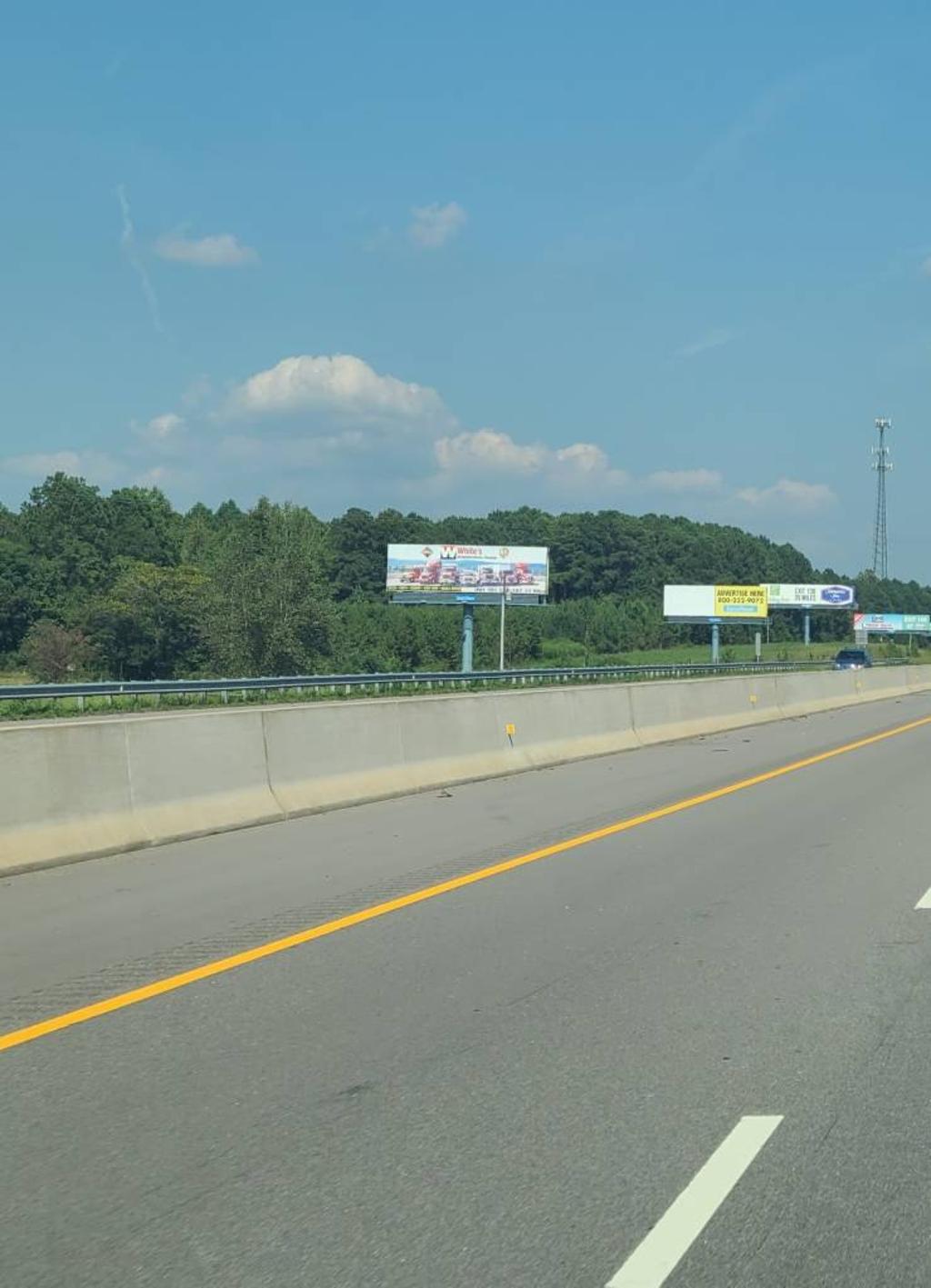 Photo of a billboard in E Fayettevlle