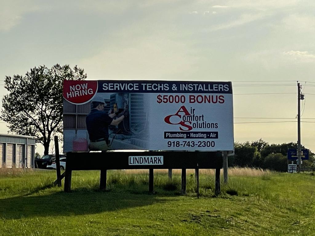 Photo of a billboard in Grnd Lke Town